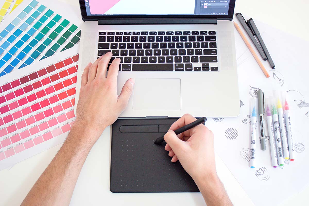 graphic designer on digital drawing pad
