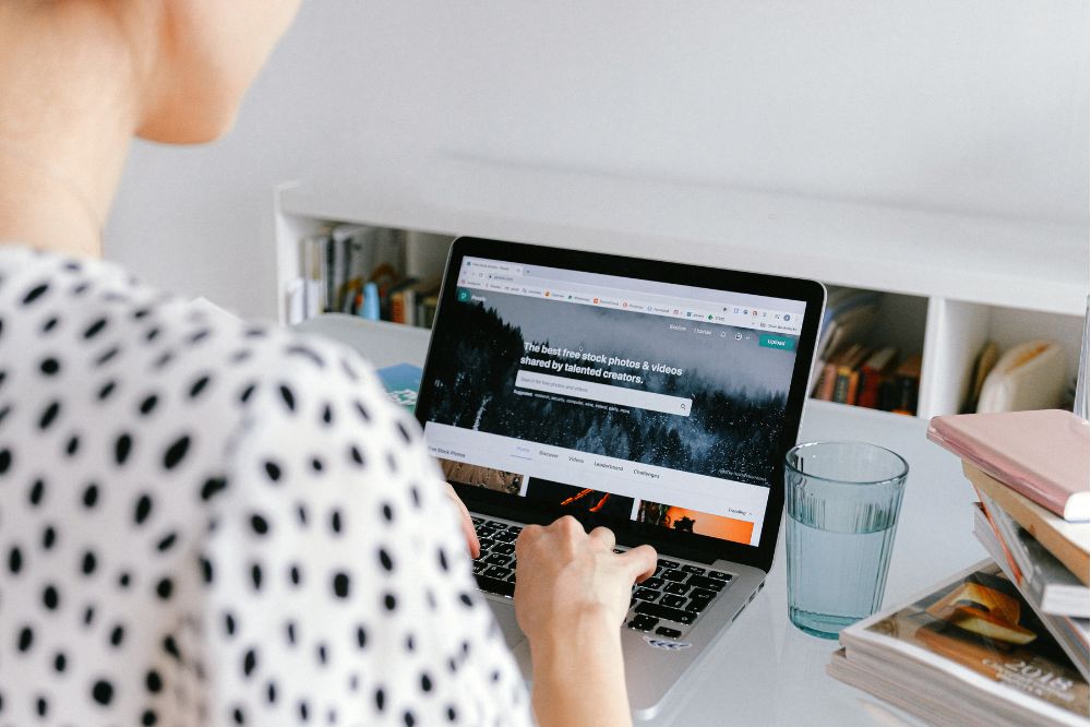 woman on laptop searching