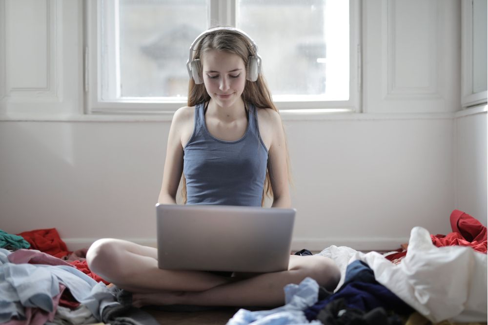 young woman writing show notes