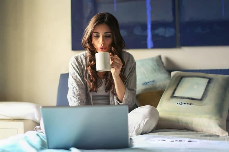 a woman repurposing an original audio file for audio content creation