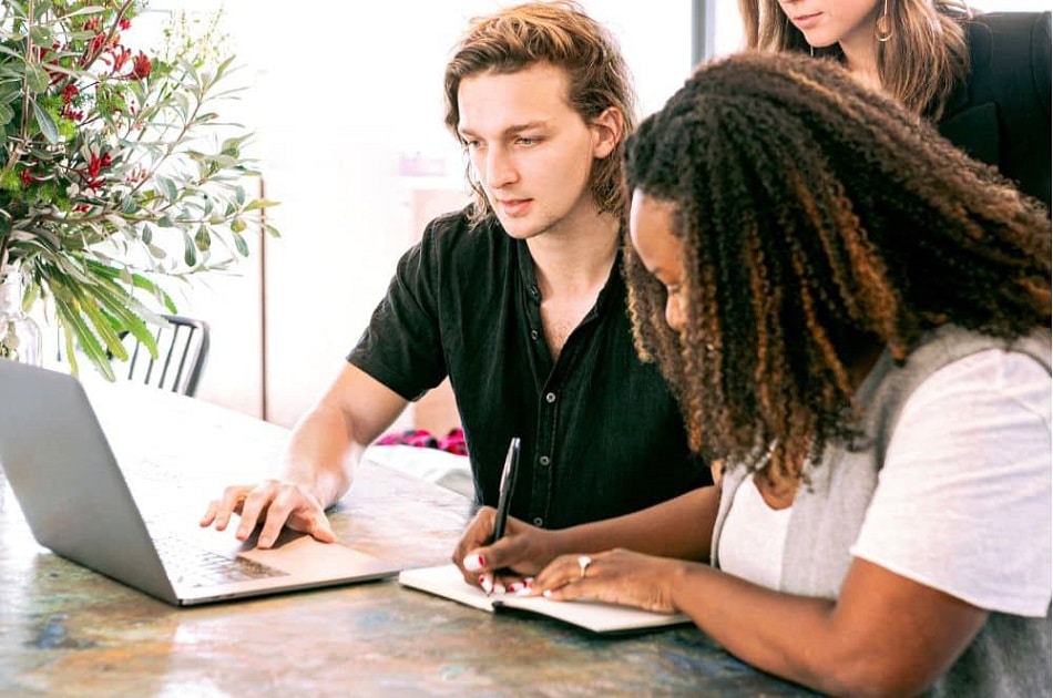 a marketing team planning for their brand's upcoming giveaway as a replacement to their previous paid ad campaign