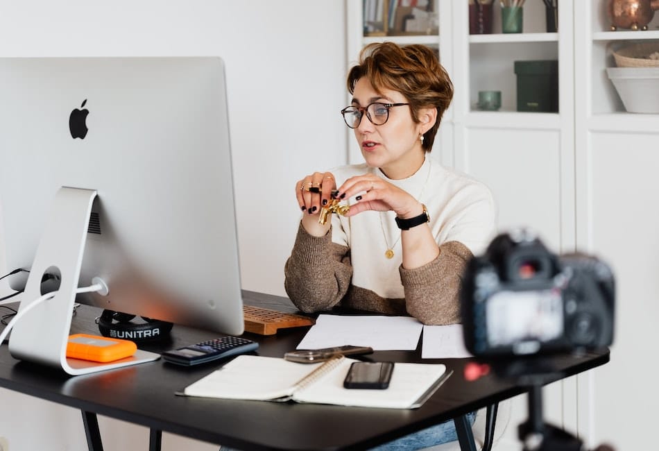 a woman hosting a webinar as one of her social media strategy to create leads