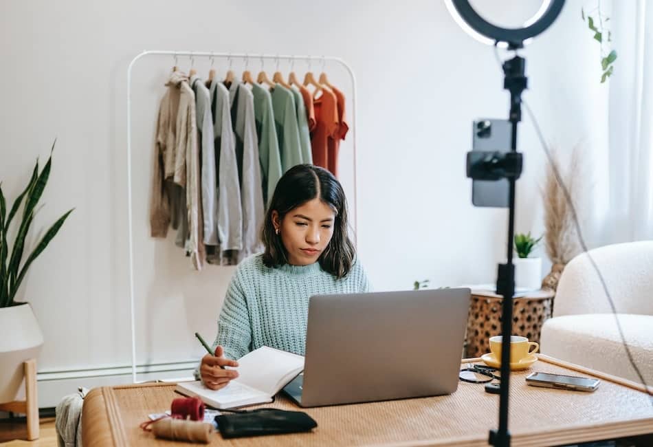 a woman working on her content plan, including scheduling her Instagram reels