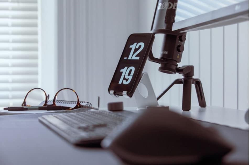 a desk with podcast paraphernalia