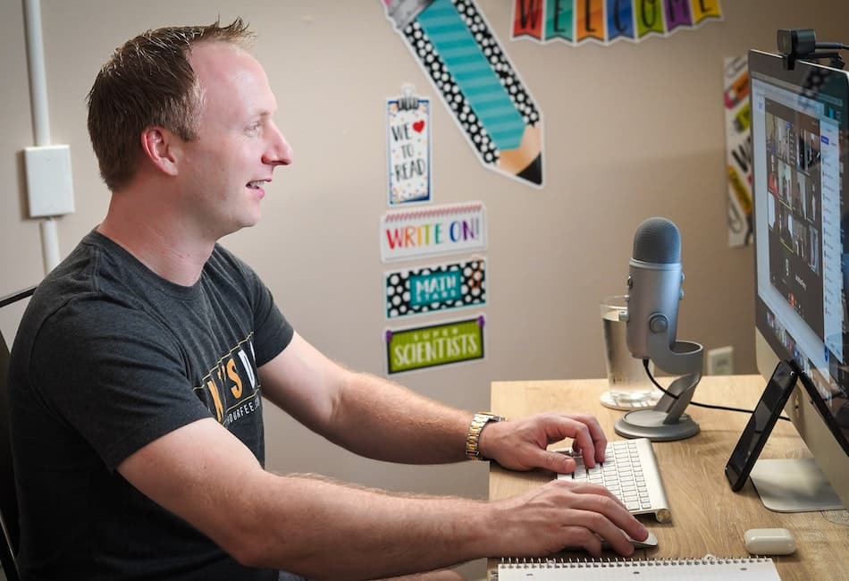 a man attending a meeting while converting audio to video using an AI podcast editing tool