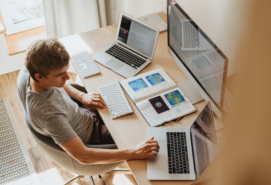 a man doing research before starting his video script draft